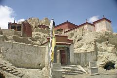 
Tsaparang is 21km west of Tholing (Zanda). From left to right are the Chapel of the Prefect, the Yamantaka Temple, the Red Temple, and the White Temple. The trail then climbs to the former residential quarters, where monks' cells were tunneled into the clay hillside. Finally, the route goes into the hillside and through tunnels before emerging in the ruins of the palace citadel at the very top of the hill, with the Demchog Temple just visible to the left. Photographing inside the buildings was strictly forbidden.
